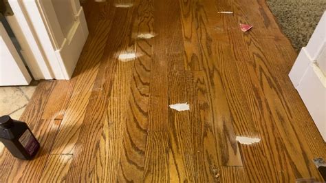 How do you fix water damaged wood floors?