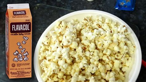 How do you get Flavacol to stick to popcorn?