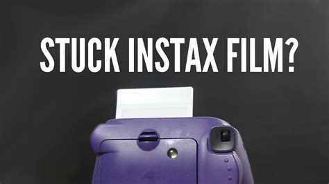 How do you get a stuck film out of an Instax camera?