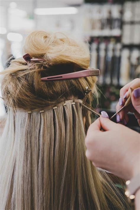 How do you get permanent hair extensions?