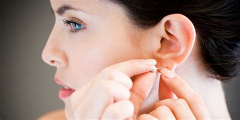 How do you get rid of ear piercing smell?