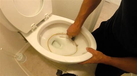 How do you get rid of thick calcium build up in a toilet?