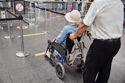 How do you go through airport security in a wheelchair?