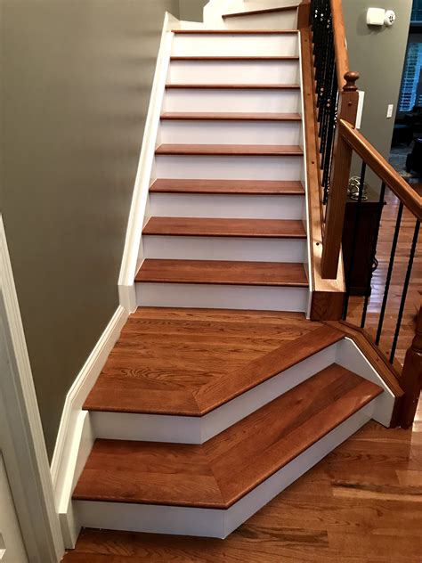 How do you install wood flooring on stairs?