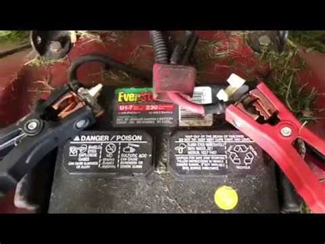 How do you jump a dead lawn mower battery?