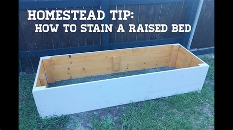 How do you keep a wooden raised bed from rotting?