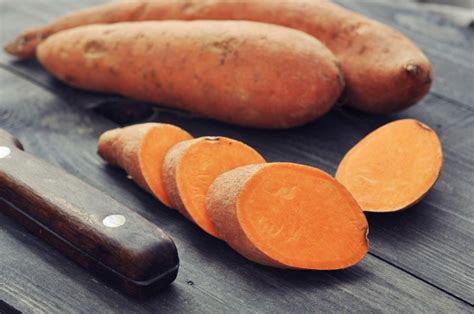 How do you keep raw sweet potatoes from turning brown?