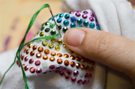 How do you keep rhinestones in place?