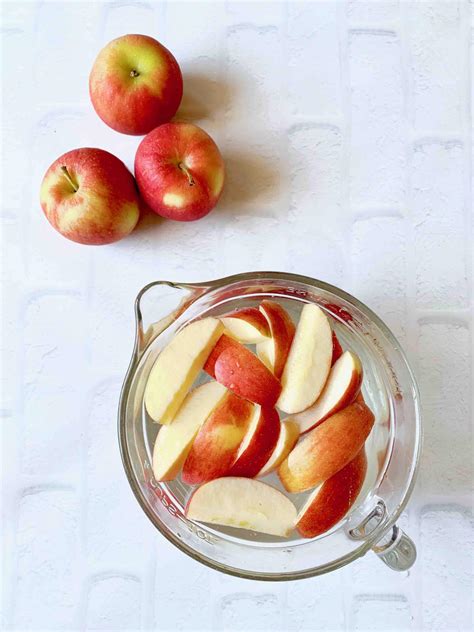 How do you keep sliced apples from turning brown with salt?