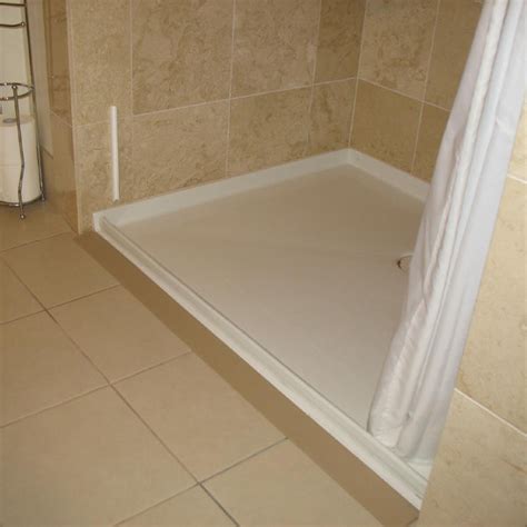 How do you keep water off the floor in a walk-in shower?