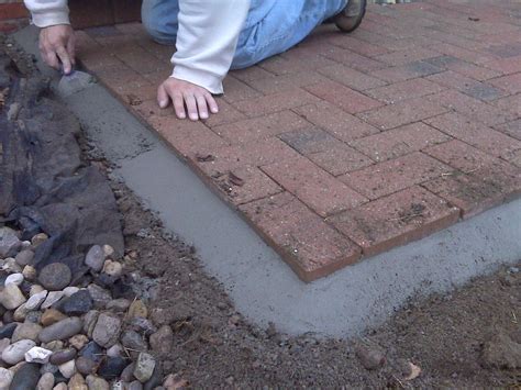 How do you lay a brick patio without cement?