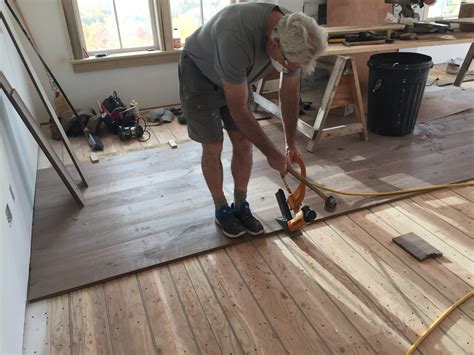 How do you lay hardwood floors straight?