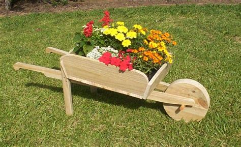 How do you line a wheelbarrow planter?