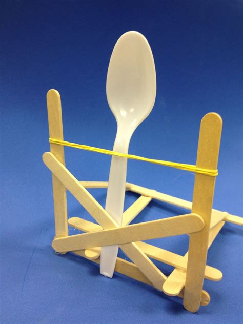 How do you make a marshmallow launcher out of popsicle sticks?