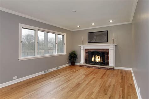 How do you make a narrow room look wider with flooring?