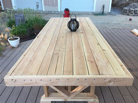 How do you make a wooden table suitable for outside?