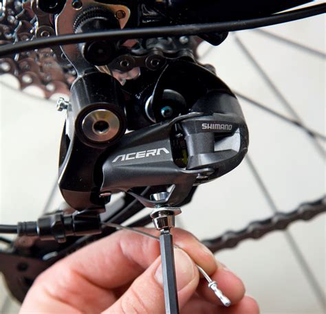 How do you manually move a derailleur?