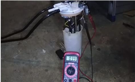 How do you manually test a fuel pump?