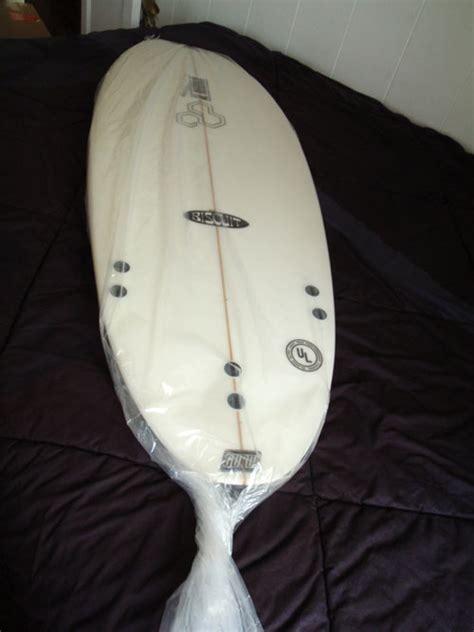 How do you pack and ship a surfboard?