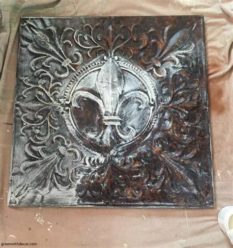 How do you paint metal wall decor?