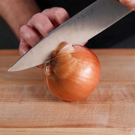 How do you peel an onion with a knife?