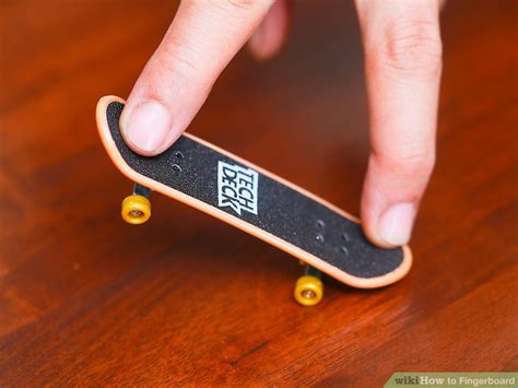 How do you pop a fingerboard?