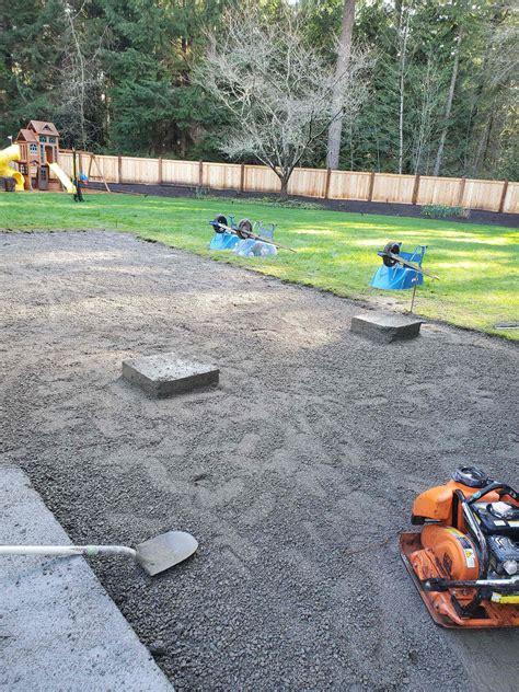 How do you prepare ground for a patio?