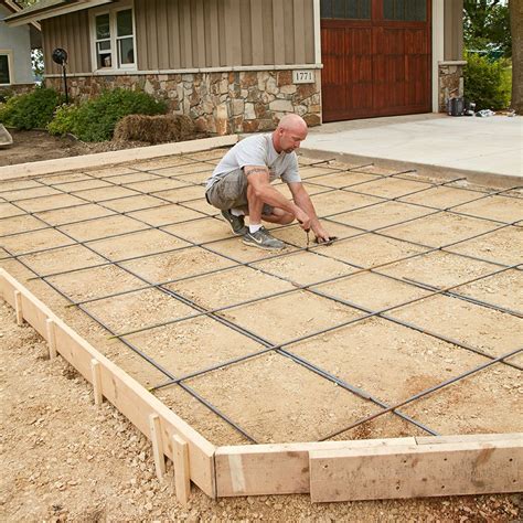 How do you prepare ground for paving slabs?