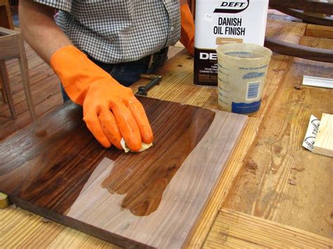 How do you prepare wood before oiling?