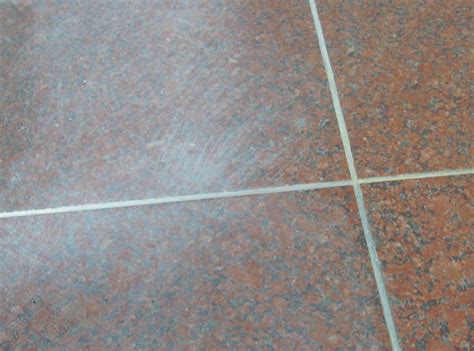 How do you prevent scratches on tiles?