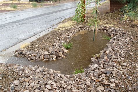 How do you redirect water with rocks?