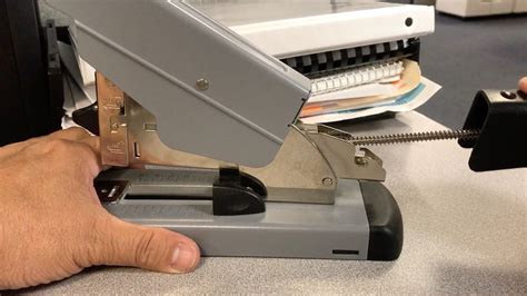 How do you refill a high capacity heavy duty stapler?