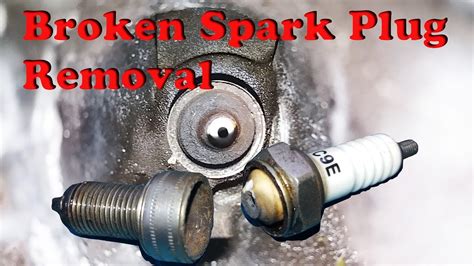 How do you remove a broken seized spark plug?