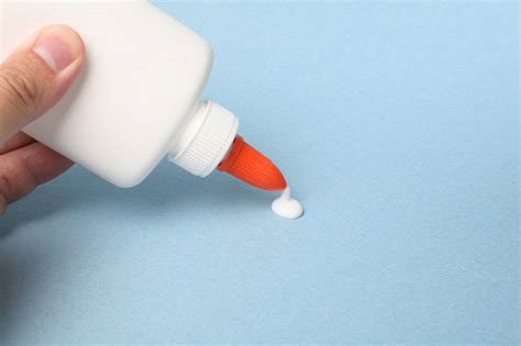 How do you remove dried glue from plastic?