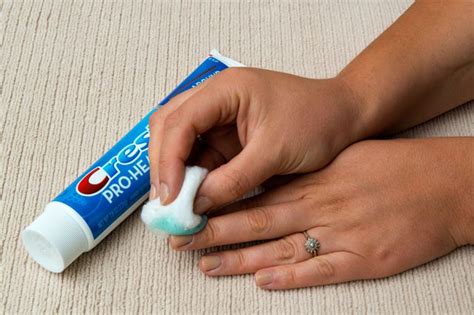 How do you remove nail polish with toothpaste?