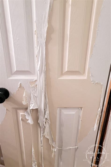 How do you remove old gloss paint from door frames?