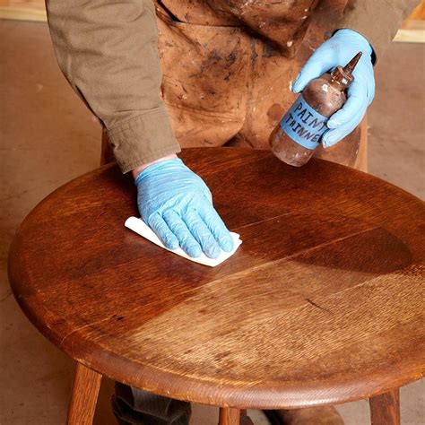 How do you remove old wax from furniture?