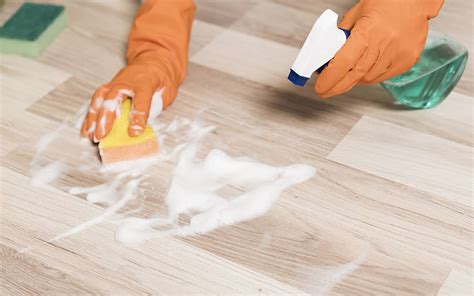 How do you remove sticky residue from vinyl flooring?