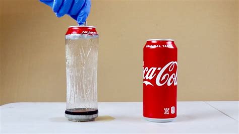 How do you remove the top of a soda can?