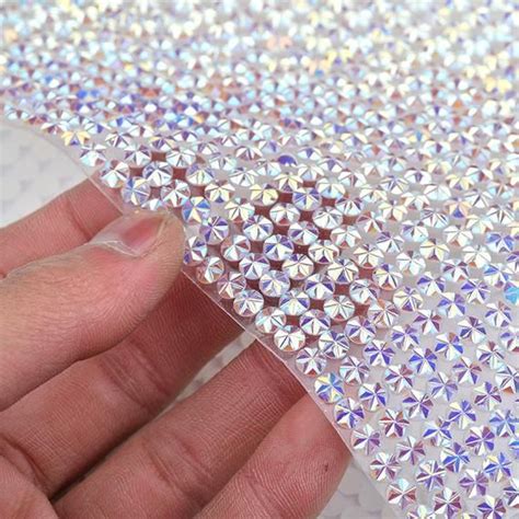 How do you seal rhinestones on fabric?