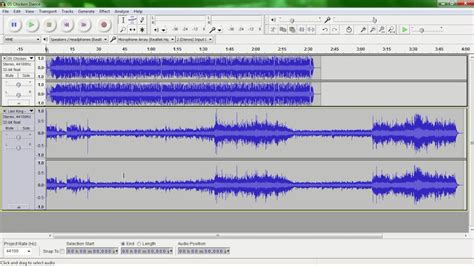 How do you select multiple tracks to move in Audacity?