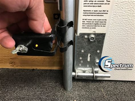 How do you shield a garage door sensor?