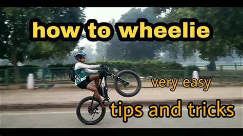 How do you shift gears when doing a wheelie?