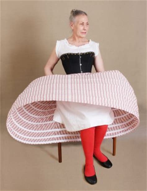 How do you sit with crinoline?