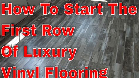 How do you start the first row of vinyl flooring?
