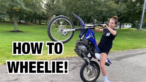 How do you stay straight in a wheelie?