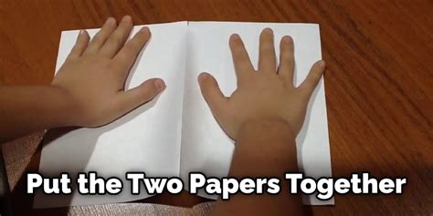 How do you stick paper together without glue or tape?