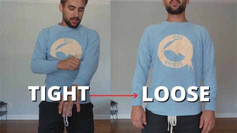 How do you stretch a sweatshirt to make it bigger?