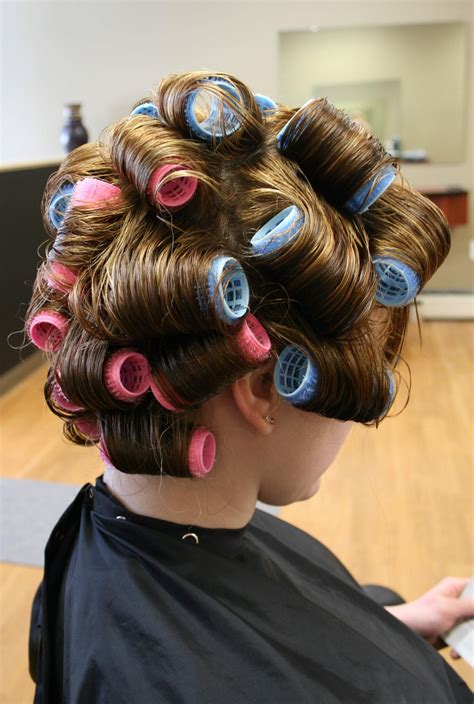 How do you style wet hair with rollers?