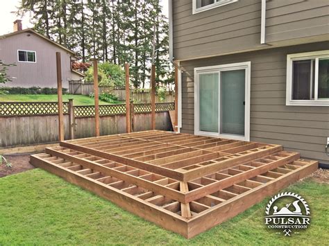 How do you support a ground-level deck?